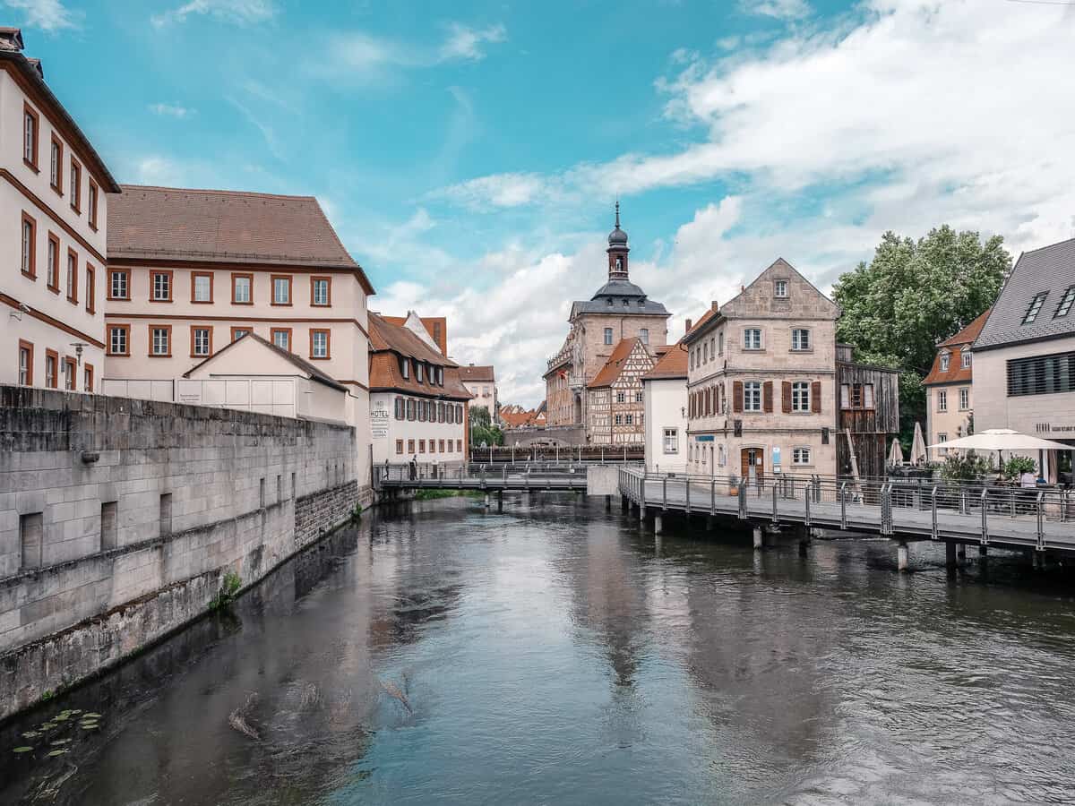 Charming riverside scenery in Bamberg, with classic Baroque and half-timbered buildings along the tranquil Pegnitz River, a highlight for those taking day trips from Nuremberg to explore nearby towns.