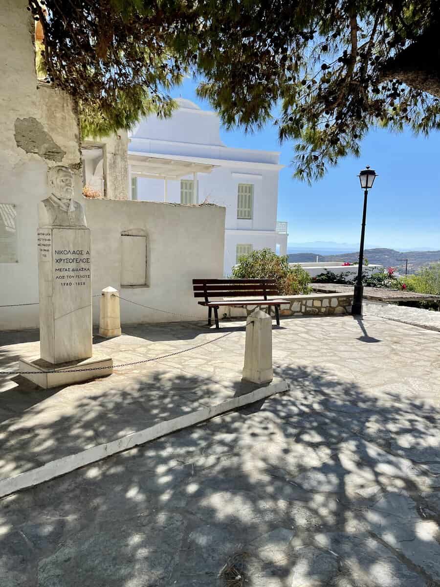 A small square with a statue in Sifnos, Greece. 