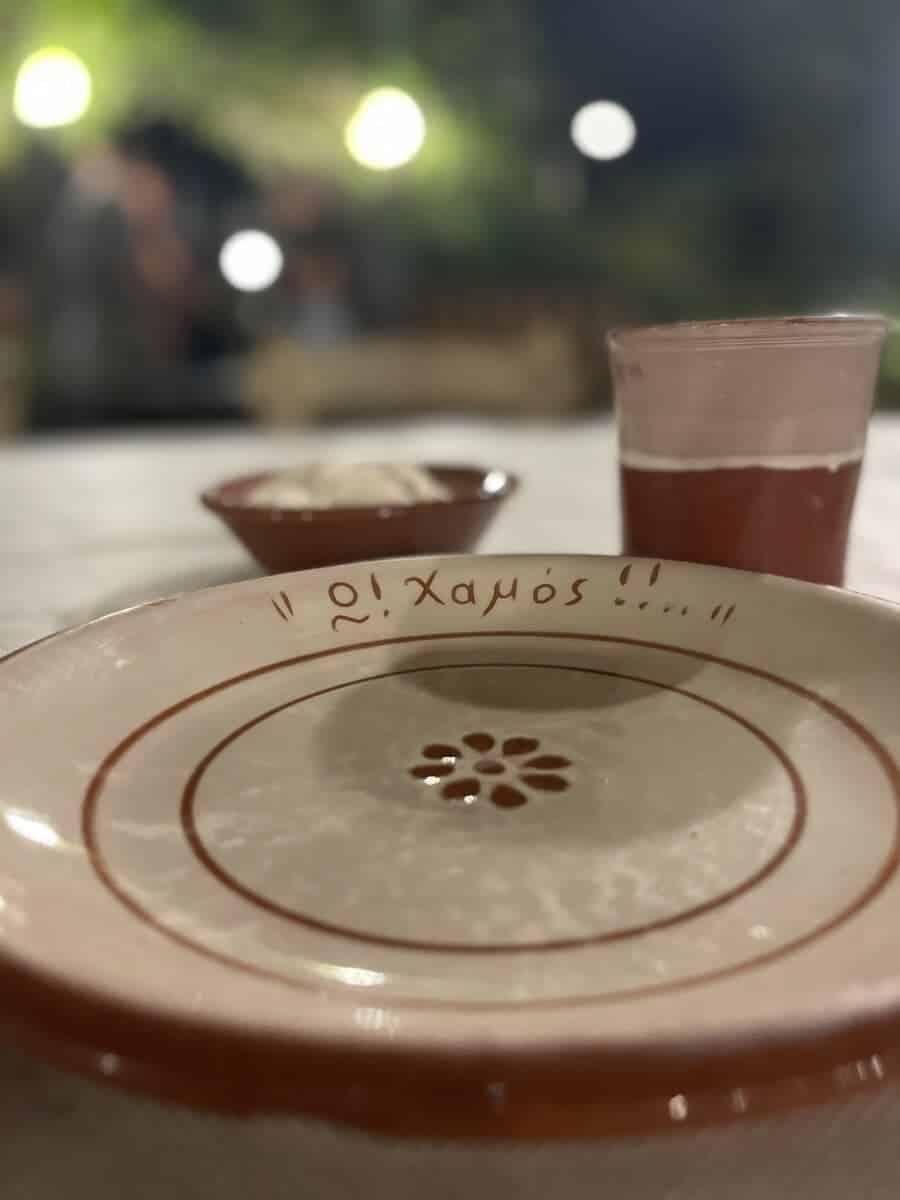 a dining plate on the table in a restaurant in Milos