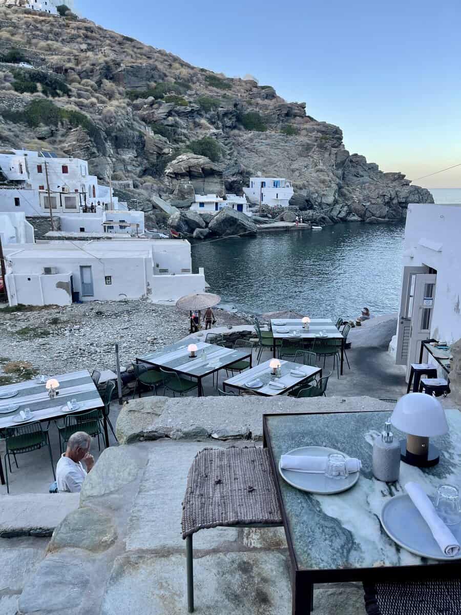 A restaurant on a rocky cliff in Sifnos Greece