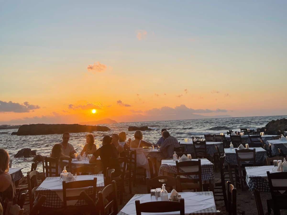 Sunset setting in Crete at one of the most famous restaurants on the island. 
