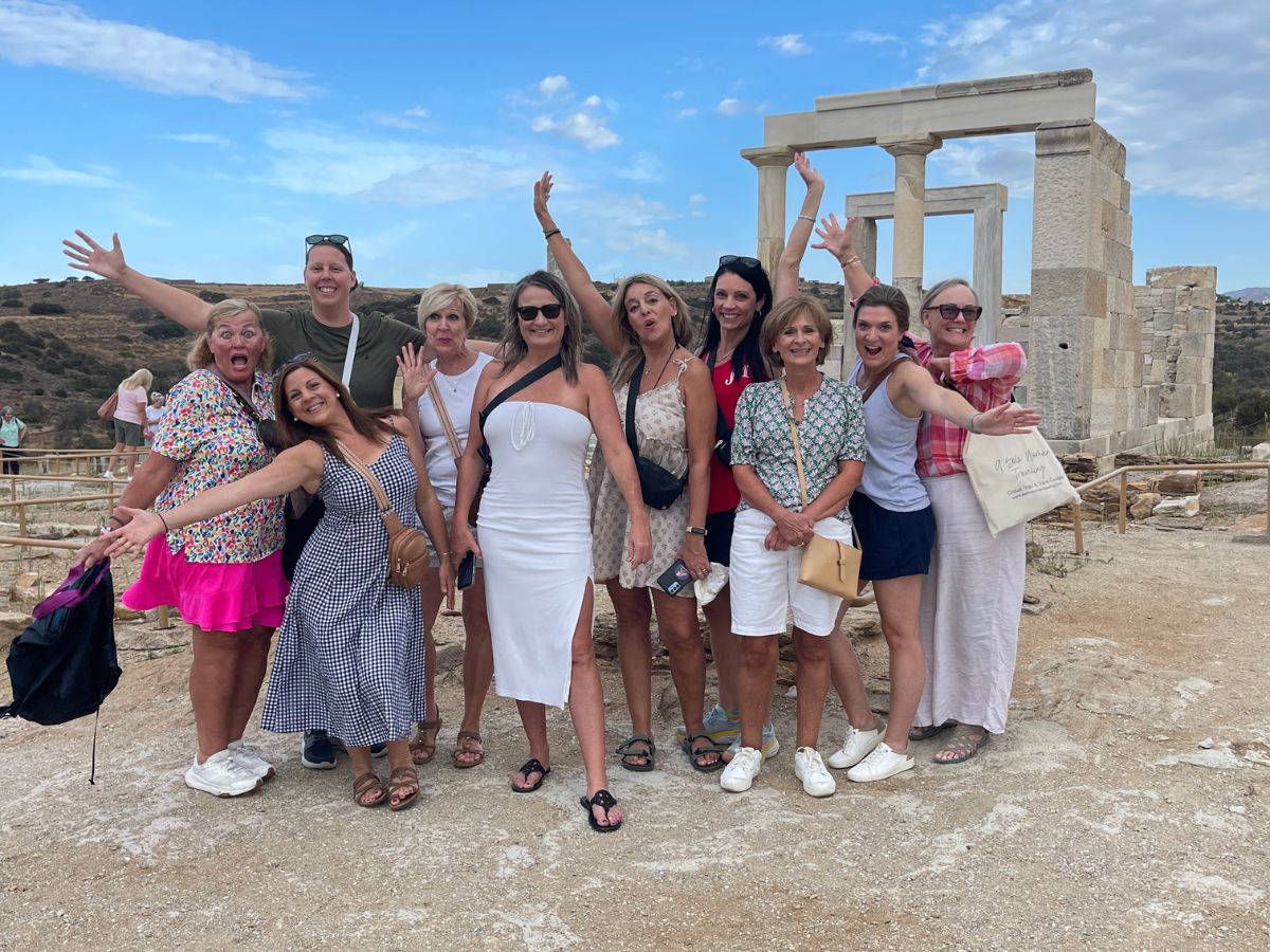 A group of women posing for a photo at Demeters Temple.