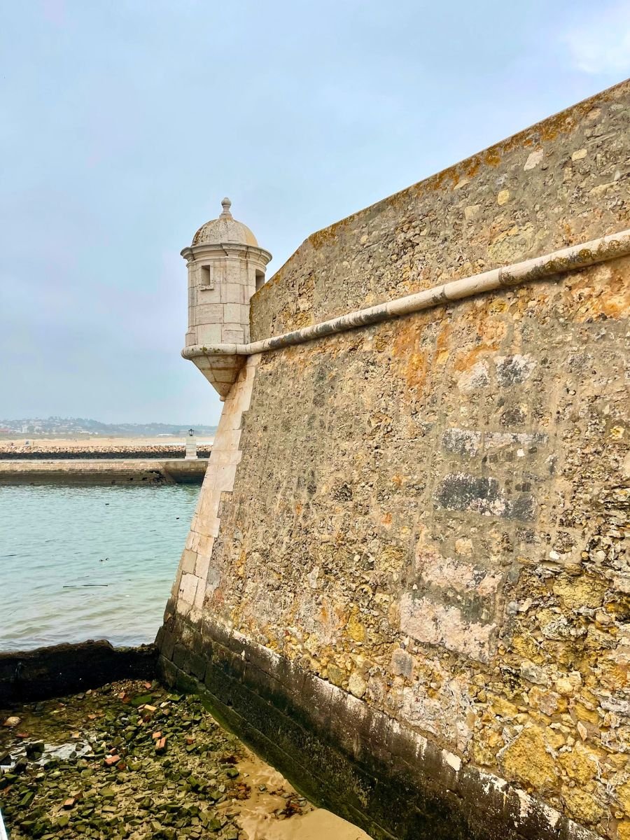 Close-up view of the watchtower on the stone walls of Forte da Ponta da Bandeira in Lagos, Portugal