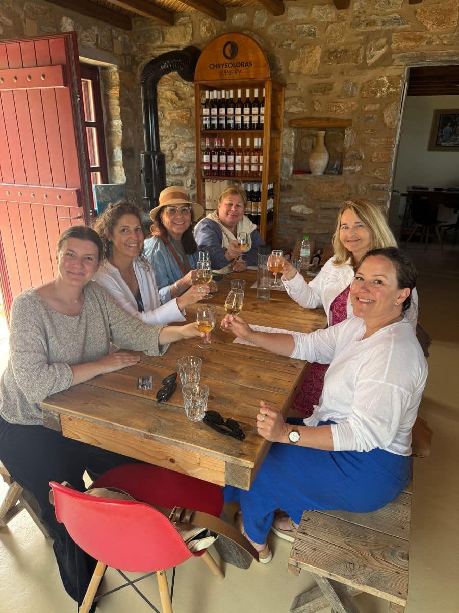 Women enjoying a wine tasting experience at Chrysoloras Winery during a Greek islands female-only tour