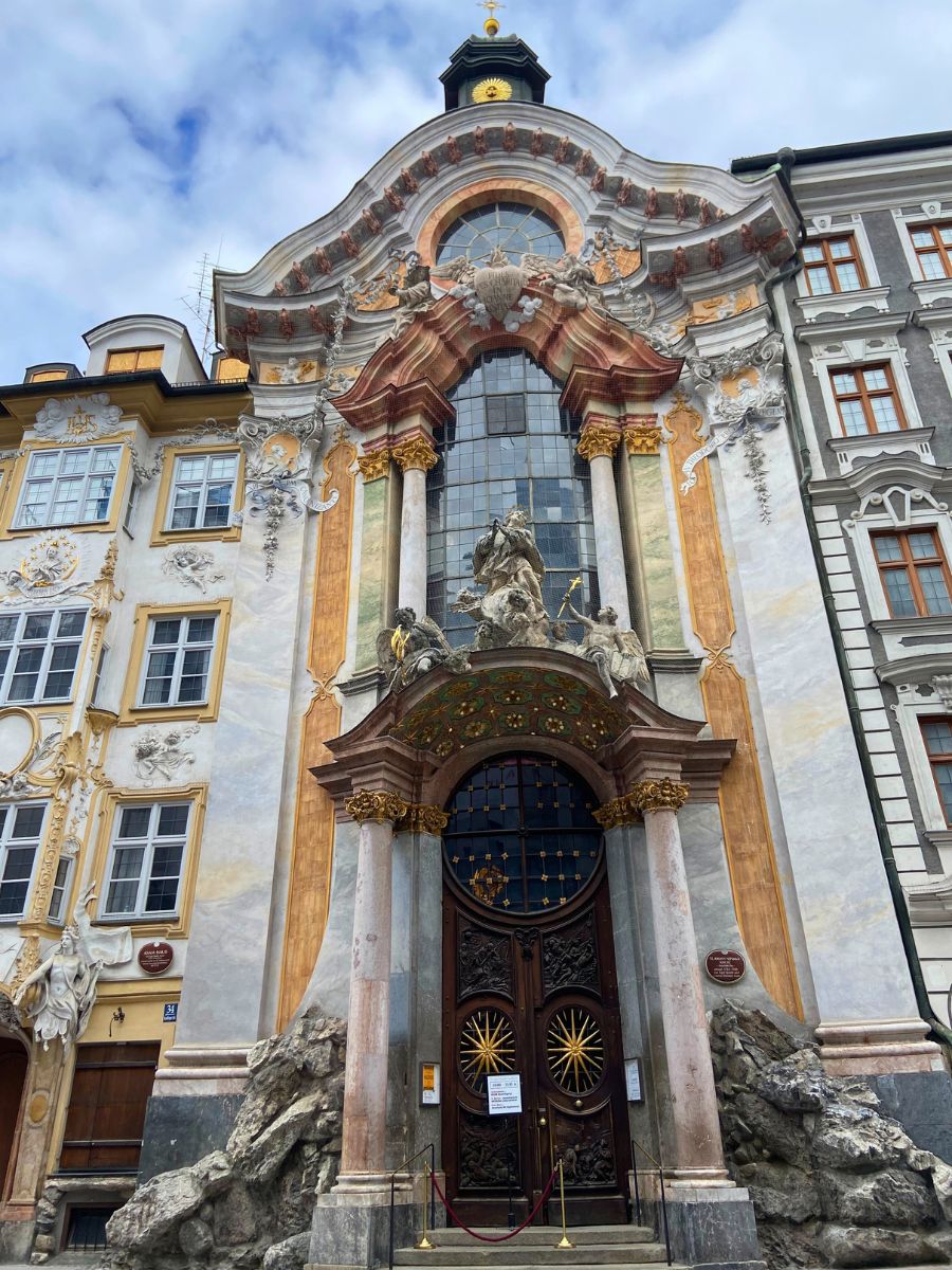 Ornate Baroque-style façade of Asam Church (Asamkirche) in Munich, Germany.