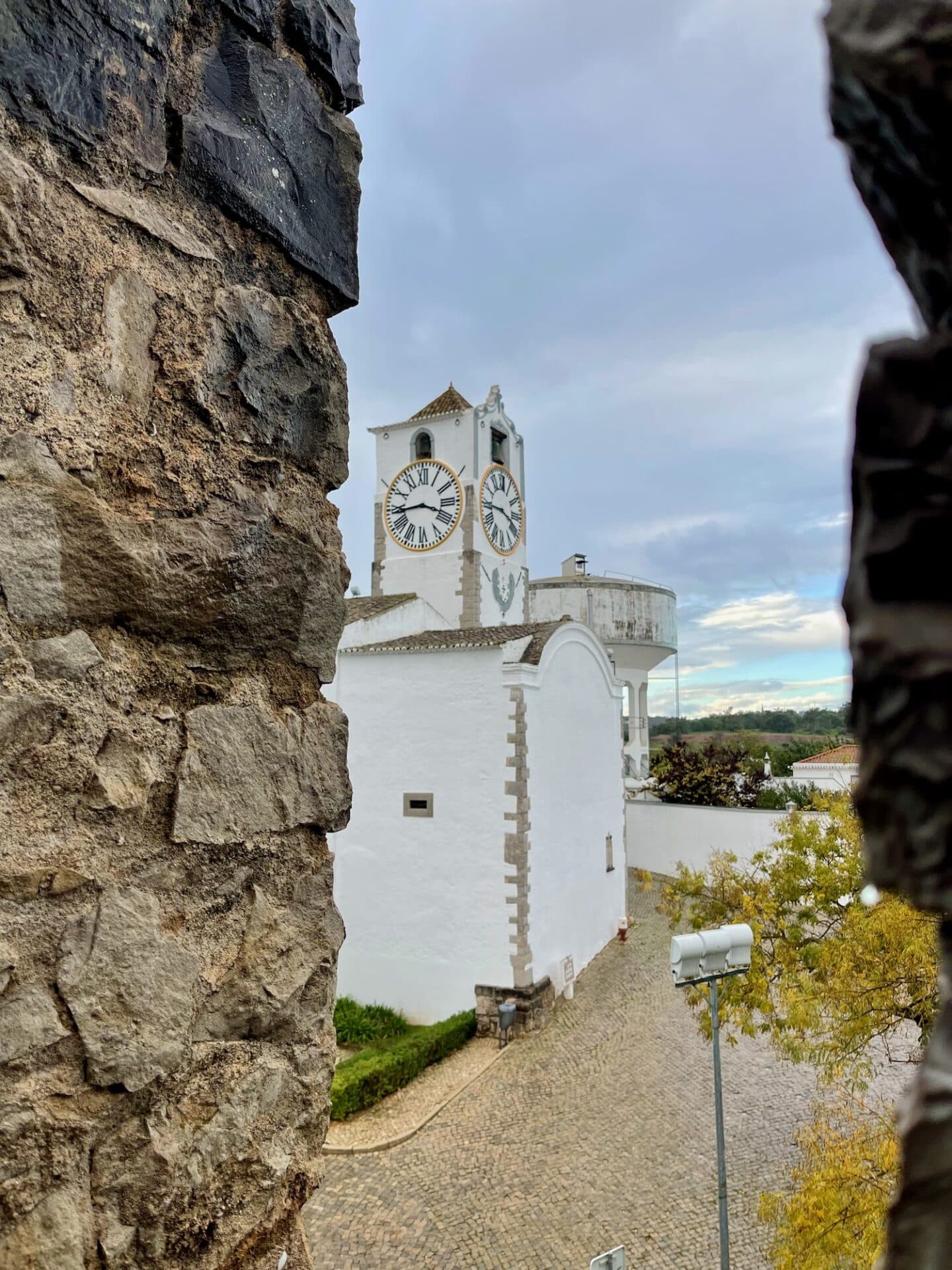 looking at the clock tower in Tavira